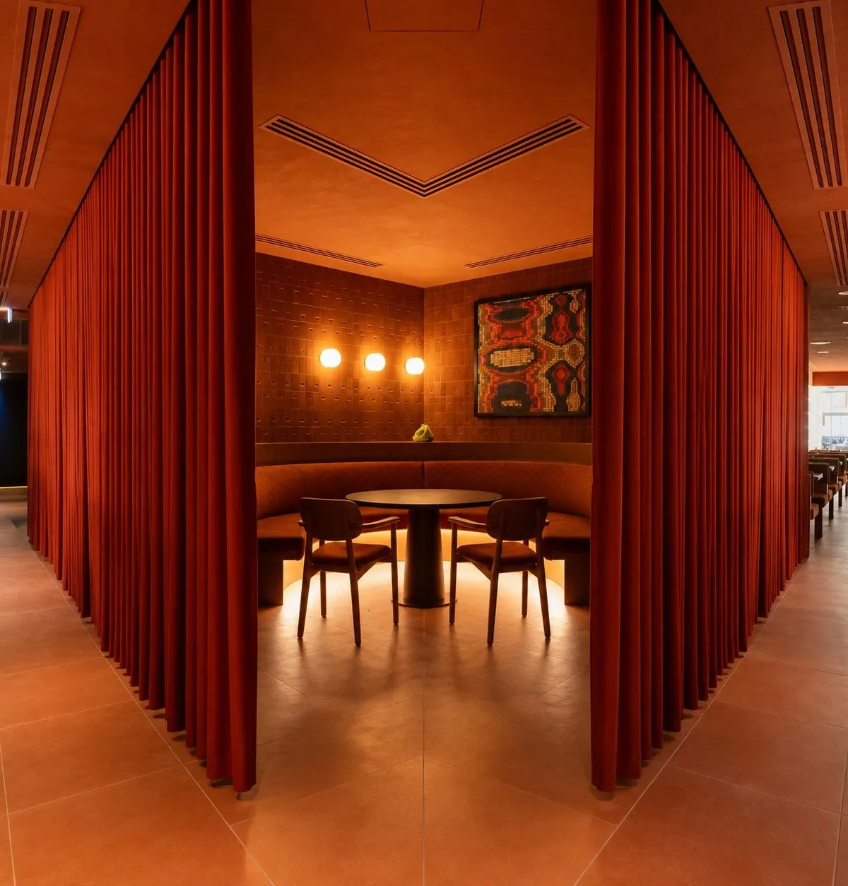 The Food Lab private dining room behind its red curtains