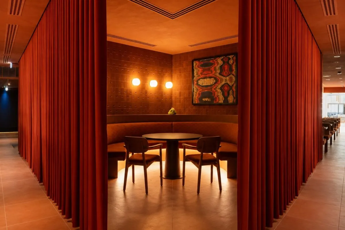 The Food Lab private dining room behind its red curtains