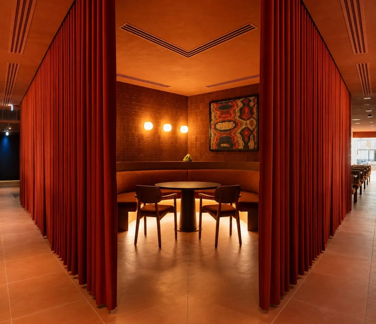 The Food Lab private dining room behind its red curtains