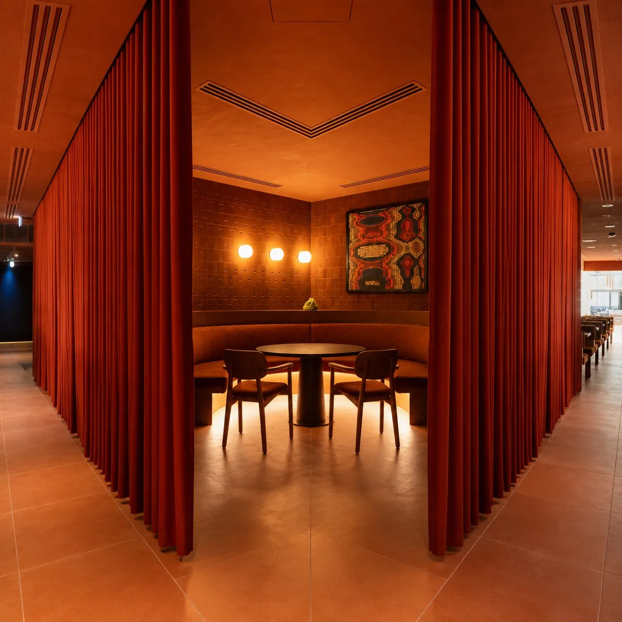The Food Lab private dining room behind its red curtains