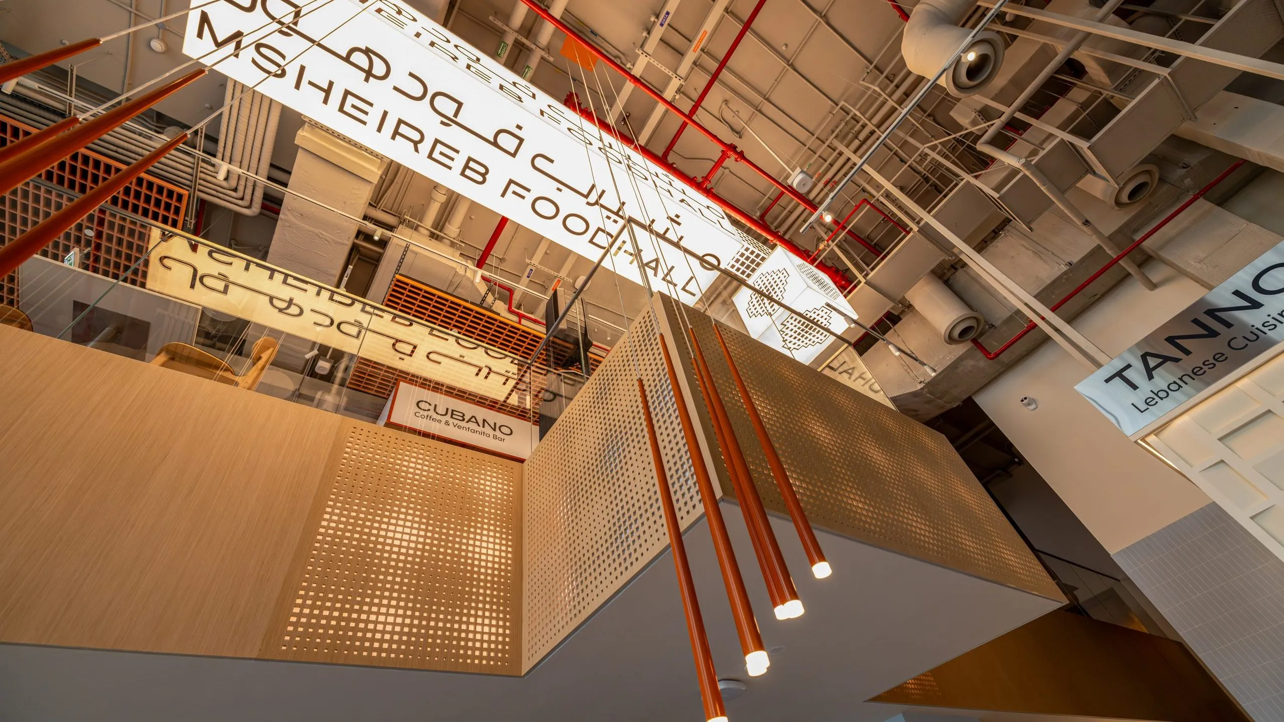 The Msheireb Foodhall sign seen from below the mezzanine